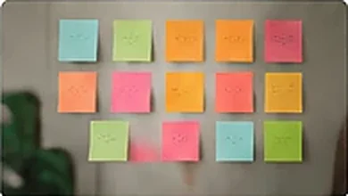 Colourful sticky notes arranged on a wall