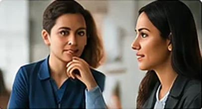 Two professionals listening thoughtfully